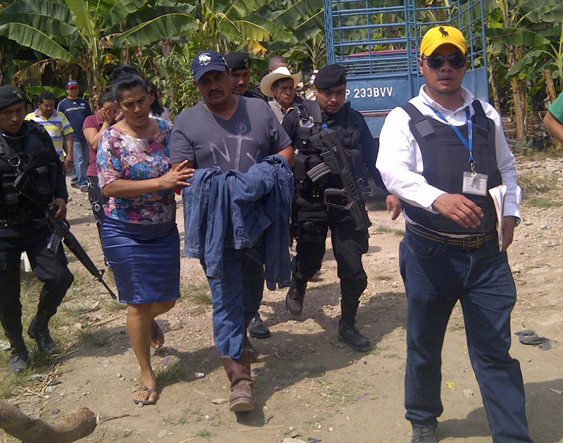 Guatemalan police escort Garcia