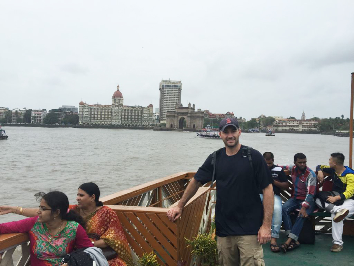 HSI Special Agent Easter on a boat with the skyline in the background