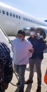 Oscar Melkin Moreno Romero, a 28-year-old noncitizen wanted for aggravated homicide in his home country of El Salvador, disembarks a removal flight at the Monseñor Óscar Arnulfo Romero International Airport in San Salvador, El Salvador, Jan. 28. Moreno Romero was removed from the United States to El Salvador by U.S. Immigration and Customs Enforcement's (ICE) Enforcement and Removal Operations (ERO) after being ordered removed by an immigration judge.