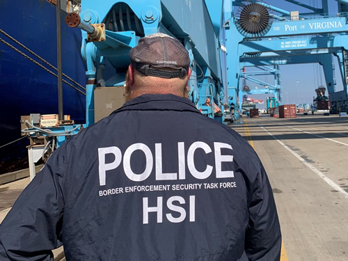 An agent from HSI Norfolk’s BEST investigates a vessel at Port of Norfolk, Virginia.   