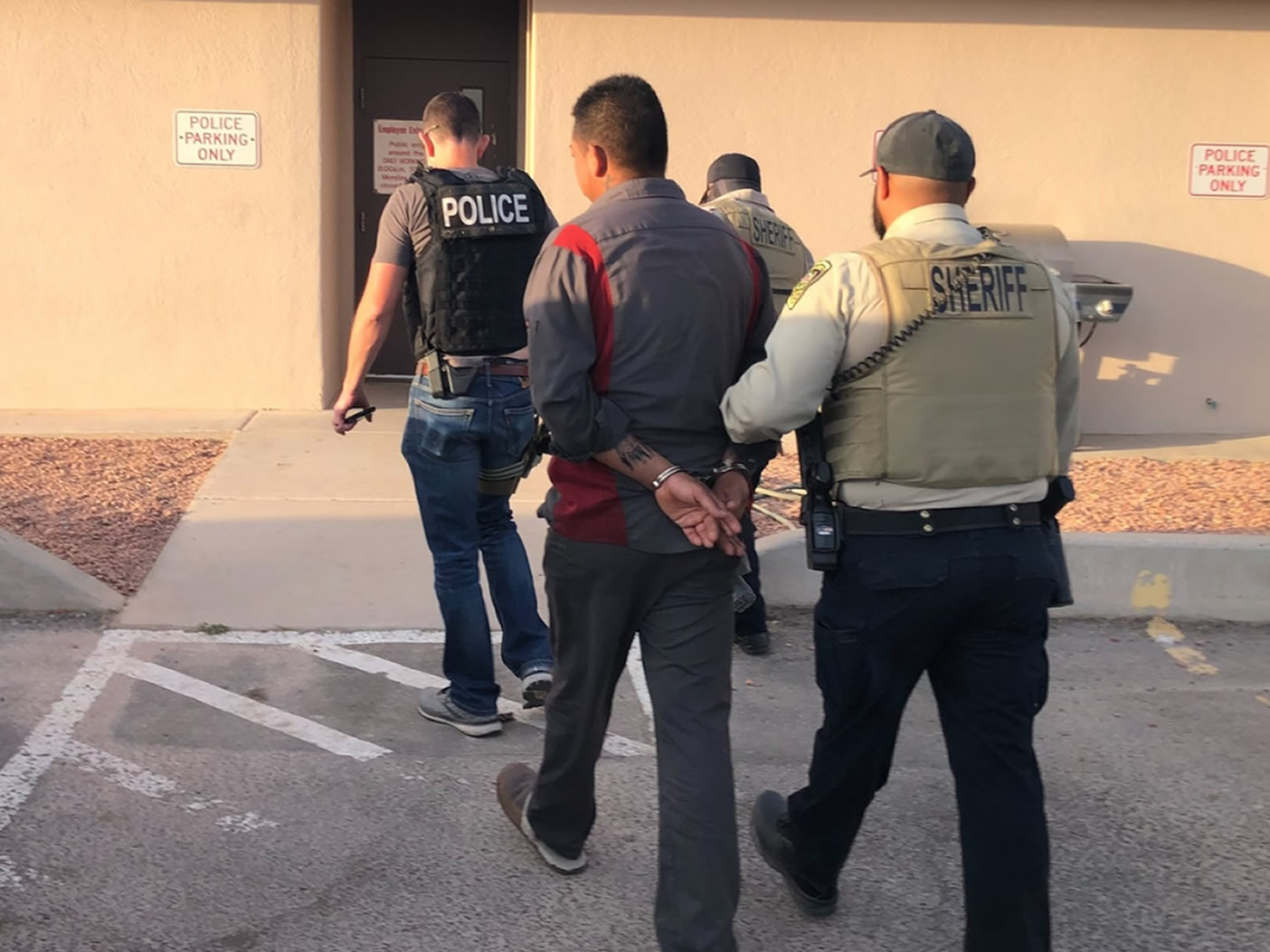 Homeland Security Investigations (HSI) special agents and deputies with the Dona Ana Sheriff’s Office of New Mexico take Emigdio Gonzalez-Gamboa into custody, June 10, 2022. 