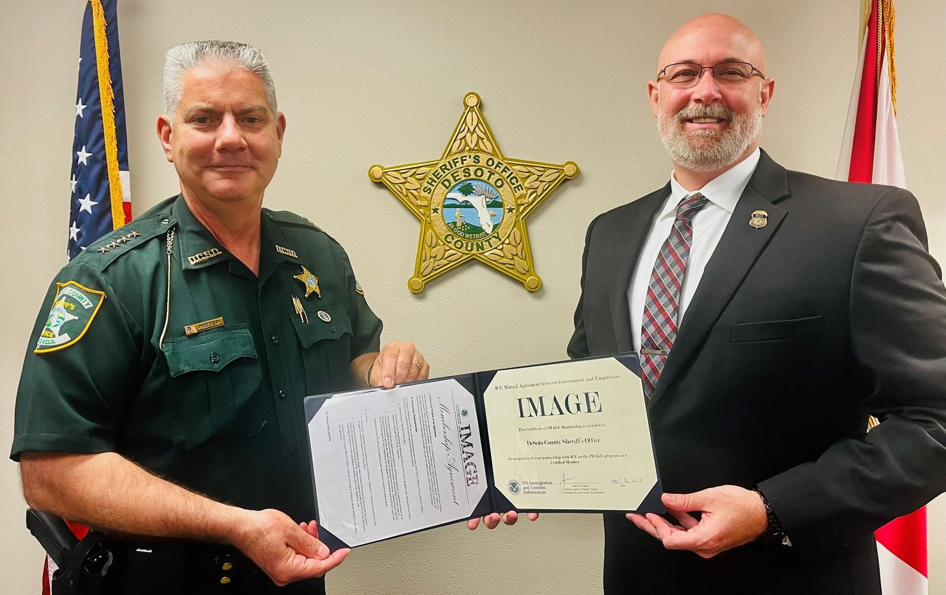 DeSoto County Sheriff James Potter poses with Special Agent Mark VanDenberghe
