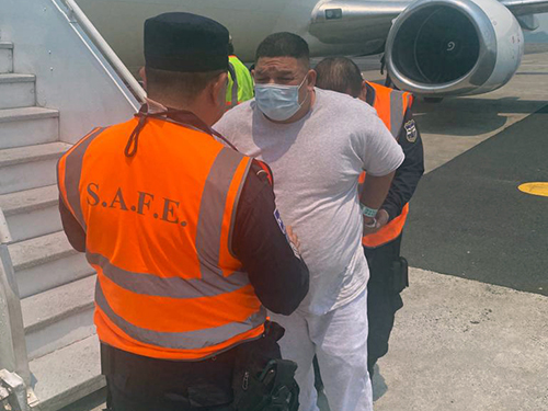 Salvadoran authorities take Marco Antonio Vigil Argueta, a 51-year-old unlawfully present Salvadoran national and known associate of the 20th Street Clique of MS-13, into custody after he disembarks an ICE Air charter flight in San Salvador, El Salvador, May 5.