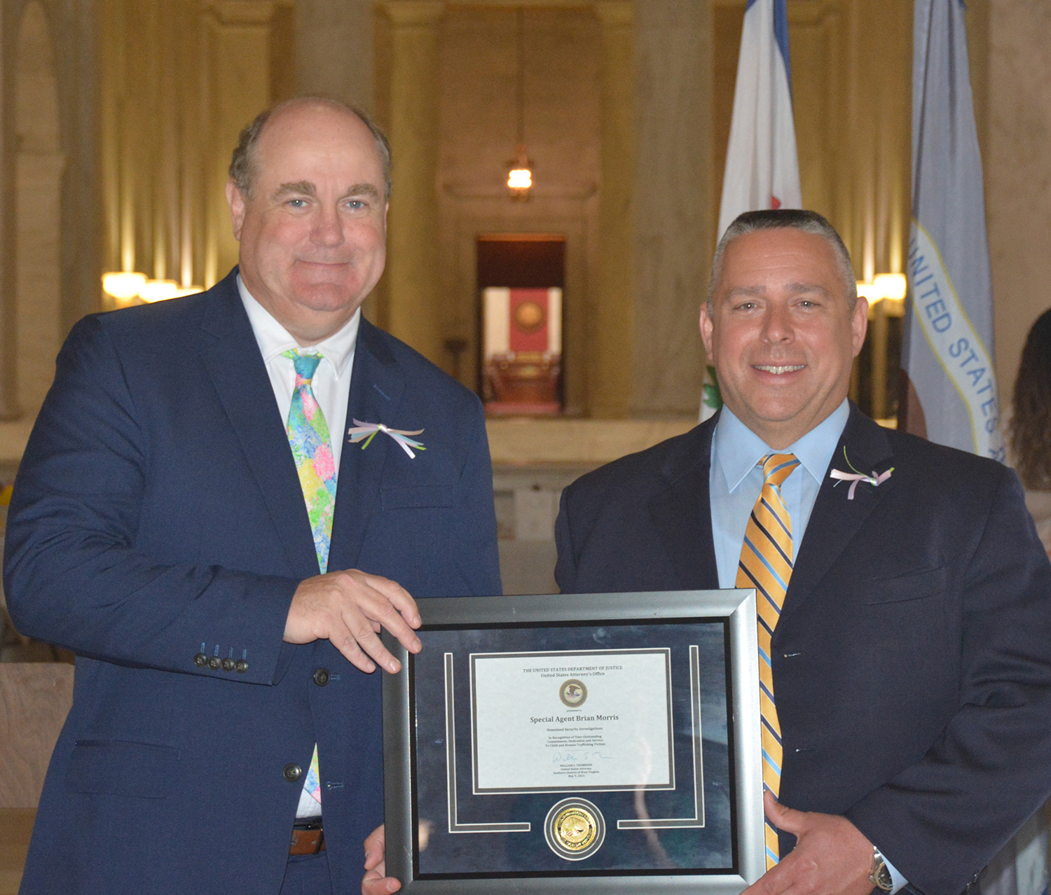U.S. Attorney Will Thompson (left) recognized HSI Special Agent Brian Morris for his work on a recent human trafficking investigation at the annual Crime Victims Assistance Awards Ceremony at the West Virginia State Capitol May 9.