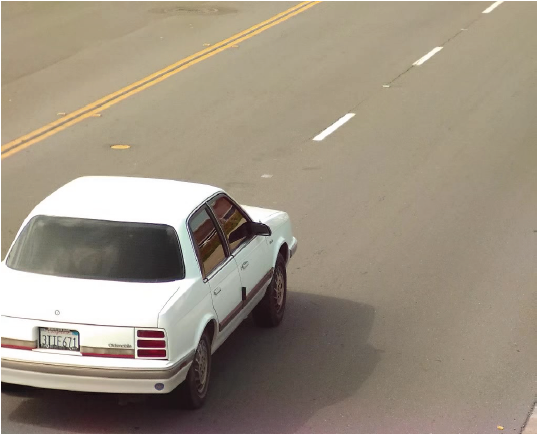 a white, four-door 1996 Oldsmobile bearing California license plate number 3TIF671
