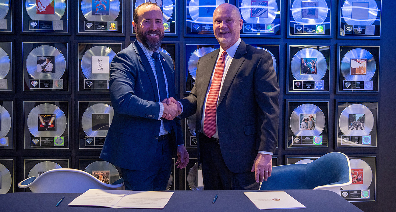 IPR Center Acting Director Ricardo Mayoral and Brad Buckles, the RIAA’s Chief Content Protection Officer