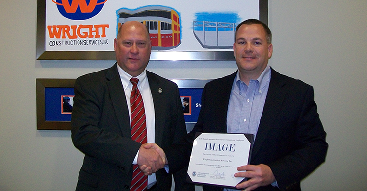  From left: James Gibbons, of HSI Chicago and  Daniel Dreckmann of Wright Construction Services