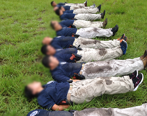 Physical fitness training gets down and dirty for Honduran students at the Federal Law Enforcement Training Center