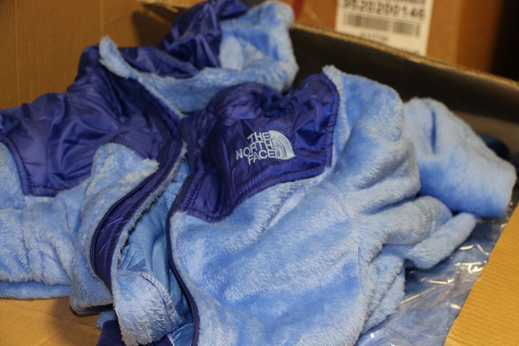 ICE HSI seizes thousands of counterfeit North Face jackets 