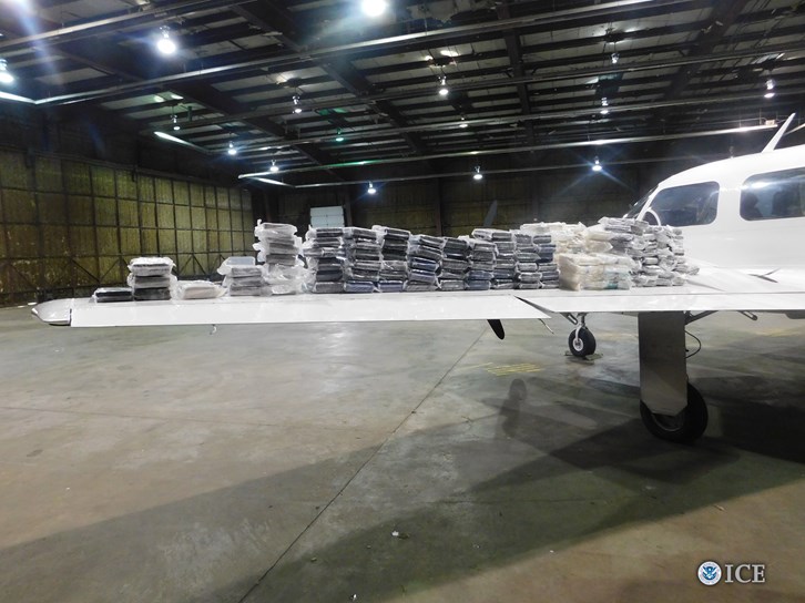 2 arrested, nearly 300 pounds of suspected cocaine seized from Canada-bound aircraft