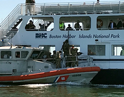 HSI Boston Special Response Team (SRT) members onboard U.S. Coast Guard cutter move alongside “cruise ship” with suspected bomber aboard for maritime active shooter exercise in Boston Harbor. 