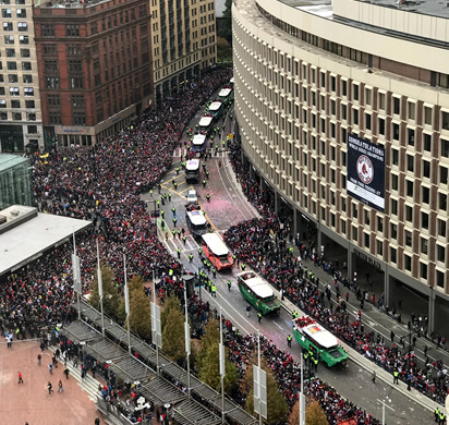 Fans along the 2018 World Series Champions parade “duck boat” parade through Boston on October 31.