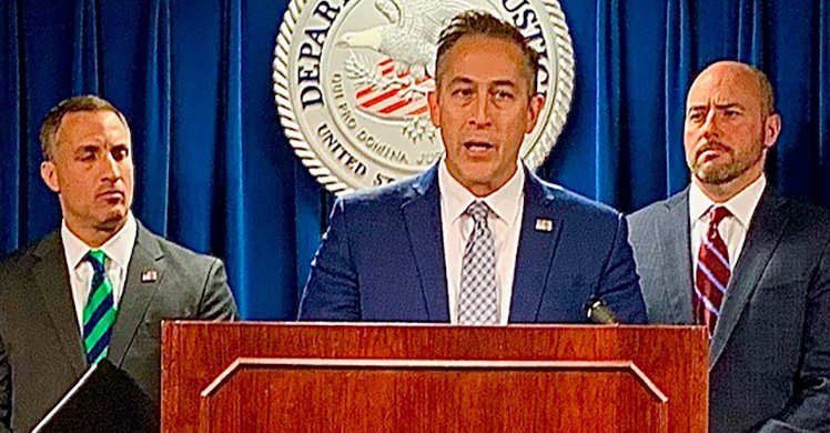 (Left to right:) Joseph R. Bonavolonta, Special Agent in Charge of the Federal Bureau of Investigation, Boston Field Division; HSI Boston acting Special Agent In Charge Jason J. Molina, and U.S. Attorney for Massachusetts Andrew E. Lelling announce results of investigation at U.S. federal court in Boston November 15. 