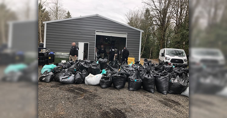 Members of the BEST collect evidence in rural Snohomish County on March 10, as part of the investigation and subsequent arrest of Kenneth Warren Rhule. 