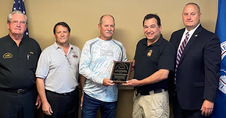 From left to right: One Hundred Club: Roy Winterbottom, Bill Eller – former President, One Hundred Club, Gus Sokos – current President, One Hundred Club , From HSI: SA Edison Sorrentini, Acting SAC Kevin Sibley