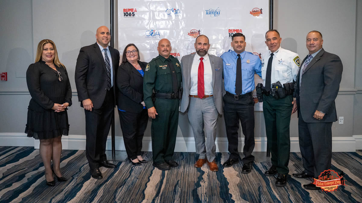 HSI Tampa Special Agent Carlos Carrasquillo, far right, stands with all the awardee from the Tampa Bay Hispanic Heritage Award Ceremony.