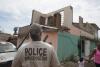 Special agents and technical enforcement officers from the ICE HSI Dallas RRT conduct welfare checks on residents in Barrio Playa, Añasco.