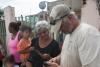 Special agents and technical enforcement officers from the ICE HSI Dallas RRT conduct welfare checks on residents in Barrio Playa, Añasco.