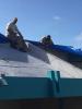 Special agents from the HSI Dallas RRT place a tarp on the roof of an orphanage in Arecibo, PR. Dallas RRT has been deployed for all three of the last major hurricanes.