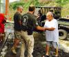 HSI special agents from New Orleans' SRT deliver food and water to Caonillas Aibonito, PR, a remote, mountainous community.