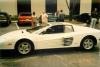 Agent Cannon moving a seized vehicle at the federal complex in Doral, Florida, as the Asset Forfeiture Group Supervisor as her colleagues observe.